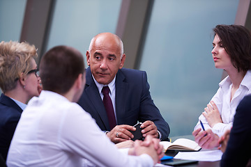 Image showing business people group on meeting at modern bright office