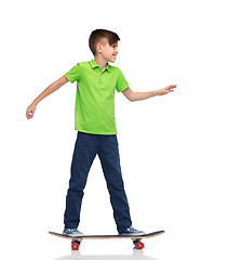 Image showing happy boy with skateboard