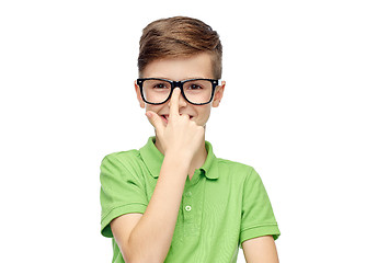 Image showing happy boy in green polo t-shirt and eyeglasses