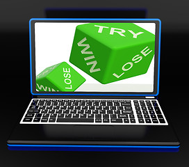 Image showing Win, Try, Lose Dices On Laptop Shows Gambling