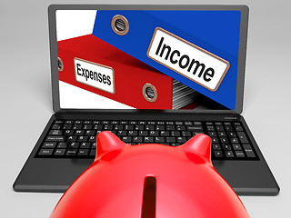 Image showing Incomes And Expenses Files On Laptop Showing Earnings