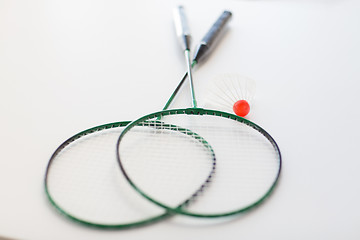 Image showing close up of badminton rackets with shuttlecock