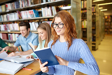 Image showing students with books preparing to exam in library