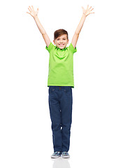 Image showing happy boy in polo t-shirt raising hands up