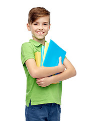 Image showing happy student boy with folders and notebooks