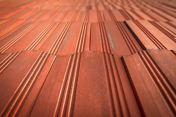 Image showing Roof tile over blue sky