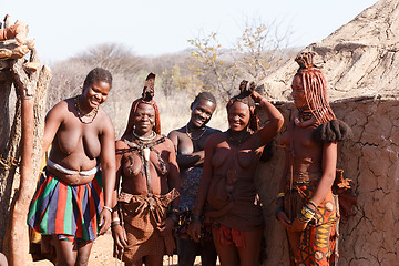 Image showing Himba and zemba woman with ornaments on the neck in the village