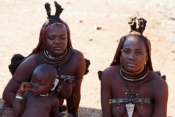 Image showing Himba woman with child in the village