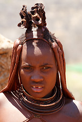 Image showing Himba woman with ornaments on the neck in the village