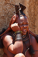 Image showing Himba woman with ornaments on the neck in the village