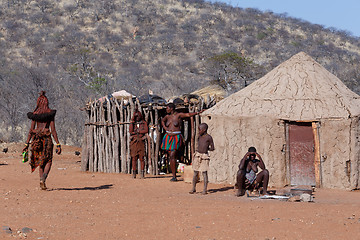 Image showing Himba and zemba woman with ornaments on the neck in the village