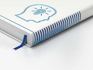Image showing Studying concept: closed book, Head With Lightbulb on white background