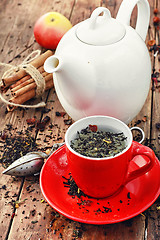 Image showing White teapot and fruit