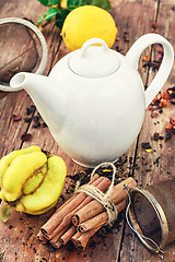 Image showing White teapot and fruit