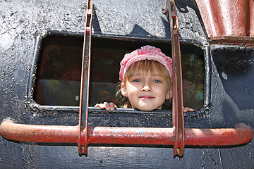 Image showing Little girl inside a welded metal attraction