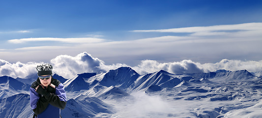 Image showing Snowboarder and panoramic view on snowy plateau