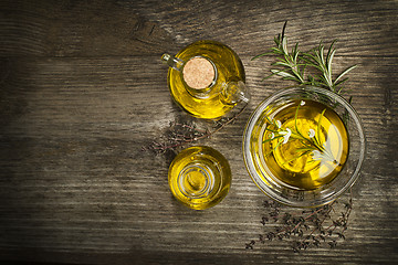 Image showing Olive oil with herbs