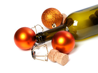 Image showing Empty bottle of wine, corks, muselets and Christmas decorations