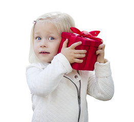 Image showing Baby Girl Holding Red Christmas Gift on White