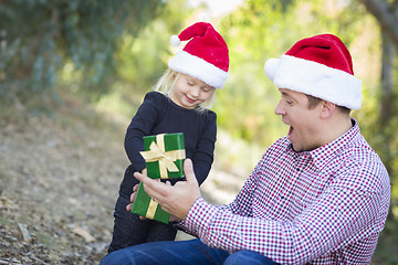 Image showing Father Giving Young Daughter Christmas Gift