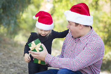 Image showing Father Giving Young Daughter Christmas Gift