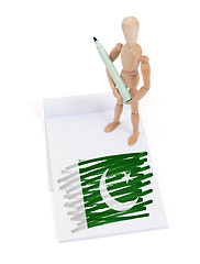 Image showing Wooden mannequin made a drawing - Pakistan