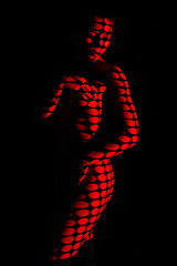 Image showing The  body of woman with red pattern