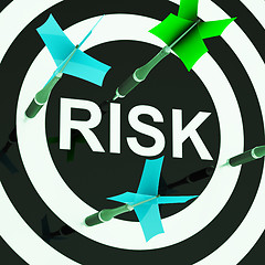 Image showing Risk On Dartboard Shows Unsafe