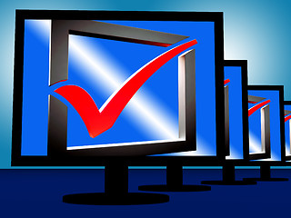 Image showing Check Mark On Monitors Showing Approved