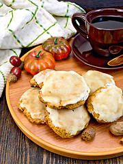 Image showing Cookies pumpkin with cup on tray