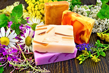 Image showing Soap homemade with flowers on board