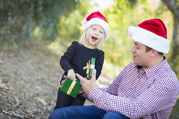 Image showing Father Giving Young Daughter Christmas Gift