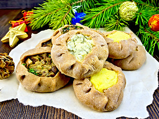 Image showing Carols with different fillings on paper and xmas decorations