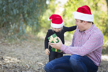 Image showing Father Giving Young Daughter Christmas Gift