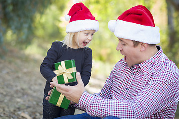 Image showing Father Giving Young Daughter Christmas Gift