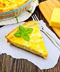 Image showing Pie with cheese and leeks on paper