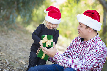 Image showing Father Giving Young Daughter Christmas Gift