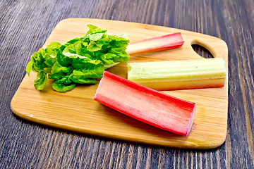 Image showing Rhubarb with leaf on board