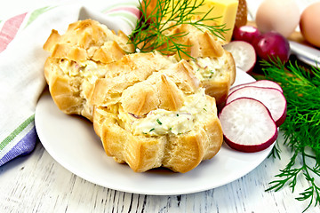 Image showing Appetizer of radish and cheese in profiteroles on white plate