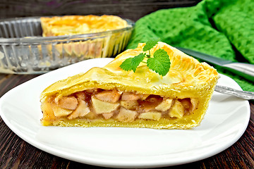 Image showing Pie apple with mint in plate on board