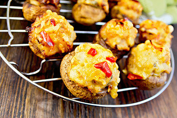 Image showing Champignons stuffed with meat on lattice