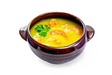 Image showing Soup-puree pumpkin with shrimps in clay bowl