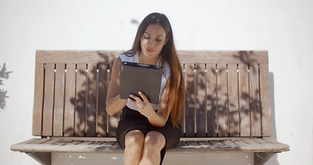 Image showing Adorable Business Woman Working on Tablet