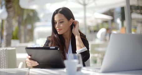 Image showing Pretty stylish woman using her laptop