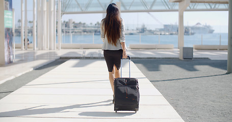 Image showing Woman traveler in an urban street