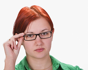 Image showing Redheaded girl with glasses