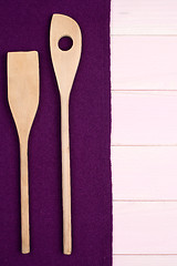 Image showing Kitchenware on purple towel