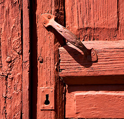 Image showing spain knocker lanzarote door wood in the red brown 