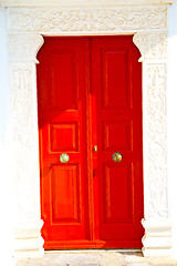 Image showing white  red brown  door in  