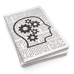 Image showing Advertising concept: Head With Gears on Newspaper background